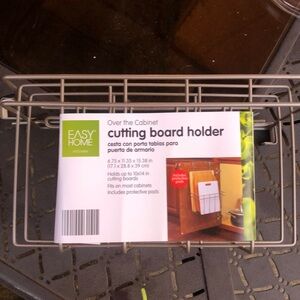 Over the cabinet cutting board holder